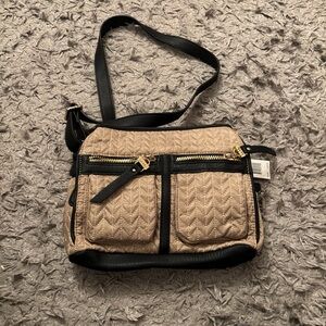 Tan and black crossbody bag